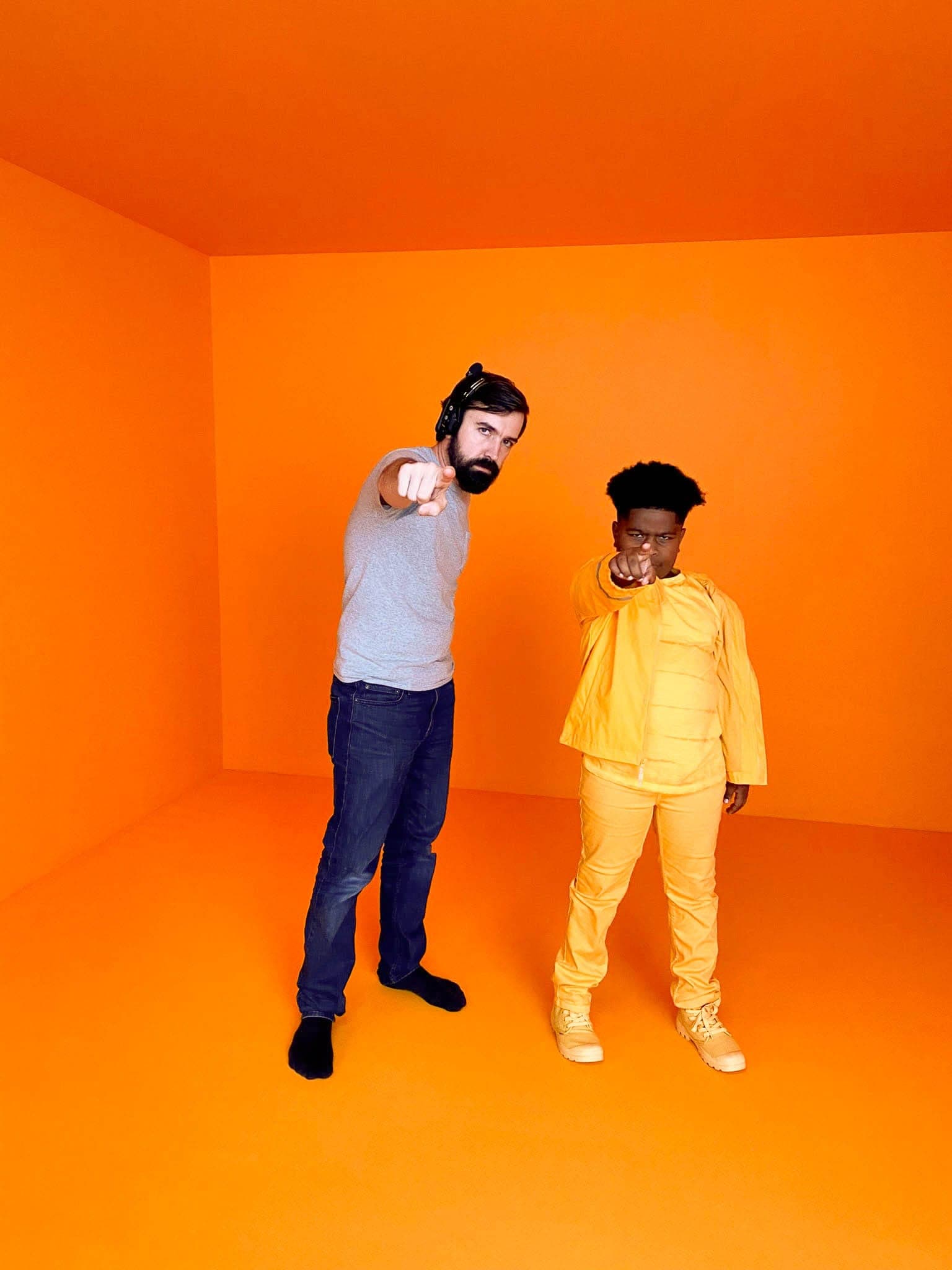 Talent and crew on an all-orange set