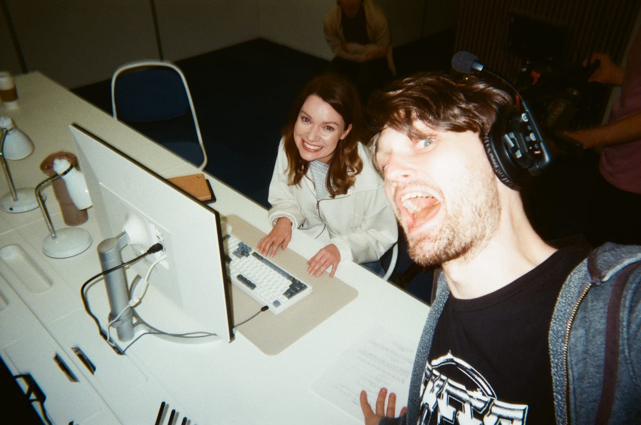 The team sharing a laugh at the edit station