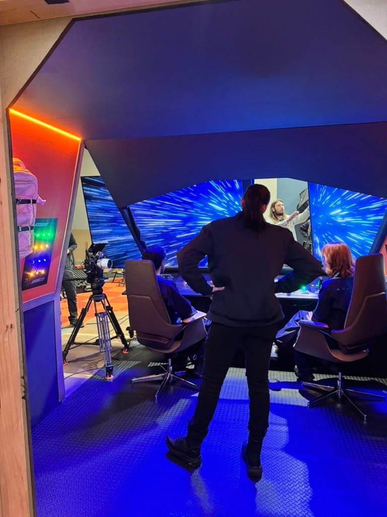 The finished cockpit windows running a hyperspace jump on massive screens during the shoot